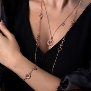 Photo of 925 sterling silver, rose gold plated necklace on a model.