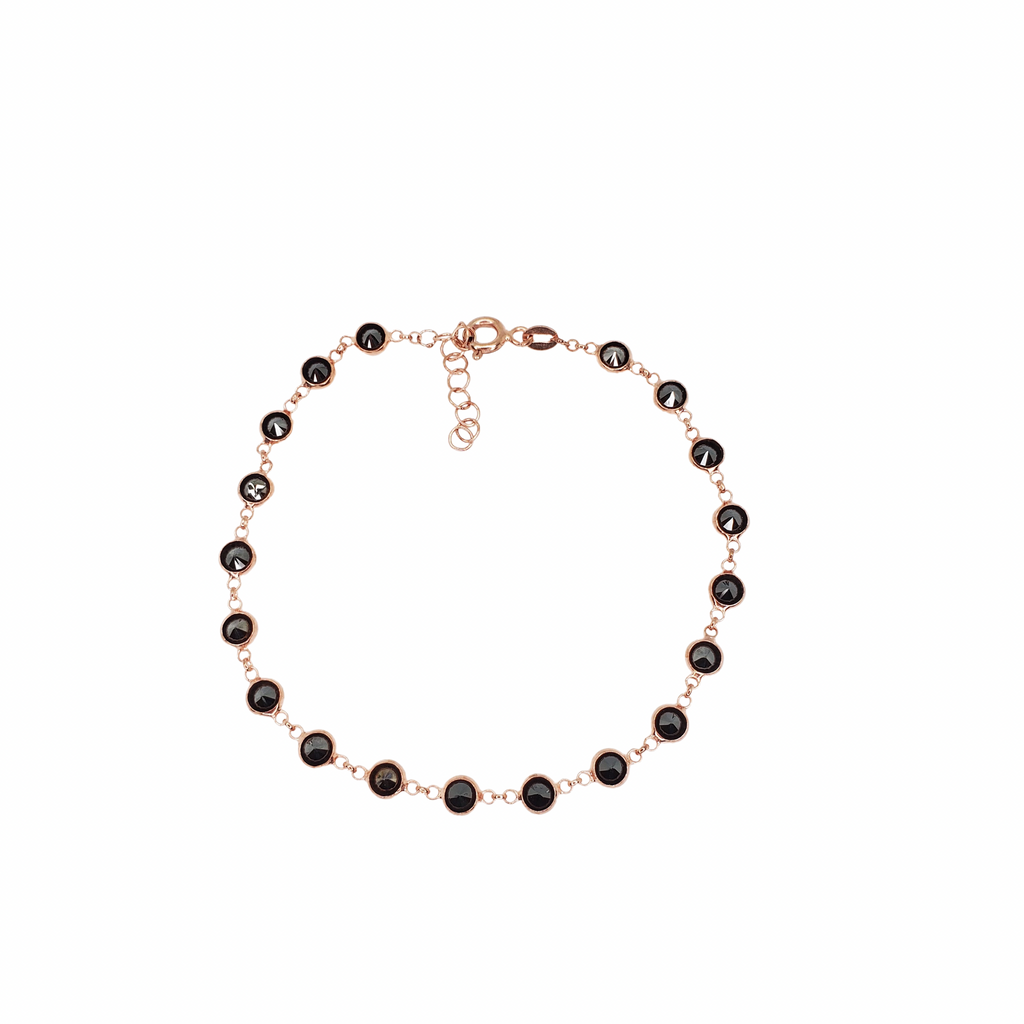 Rose gold silver bracelet with black zirconia beads.