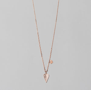 Rose gold plated, 925 sterling silver  necklace with heart pendant. Half of the pendant is decorated with white zirconia stones, complete look.