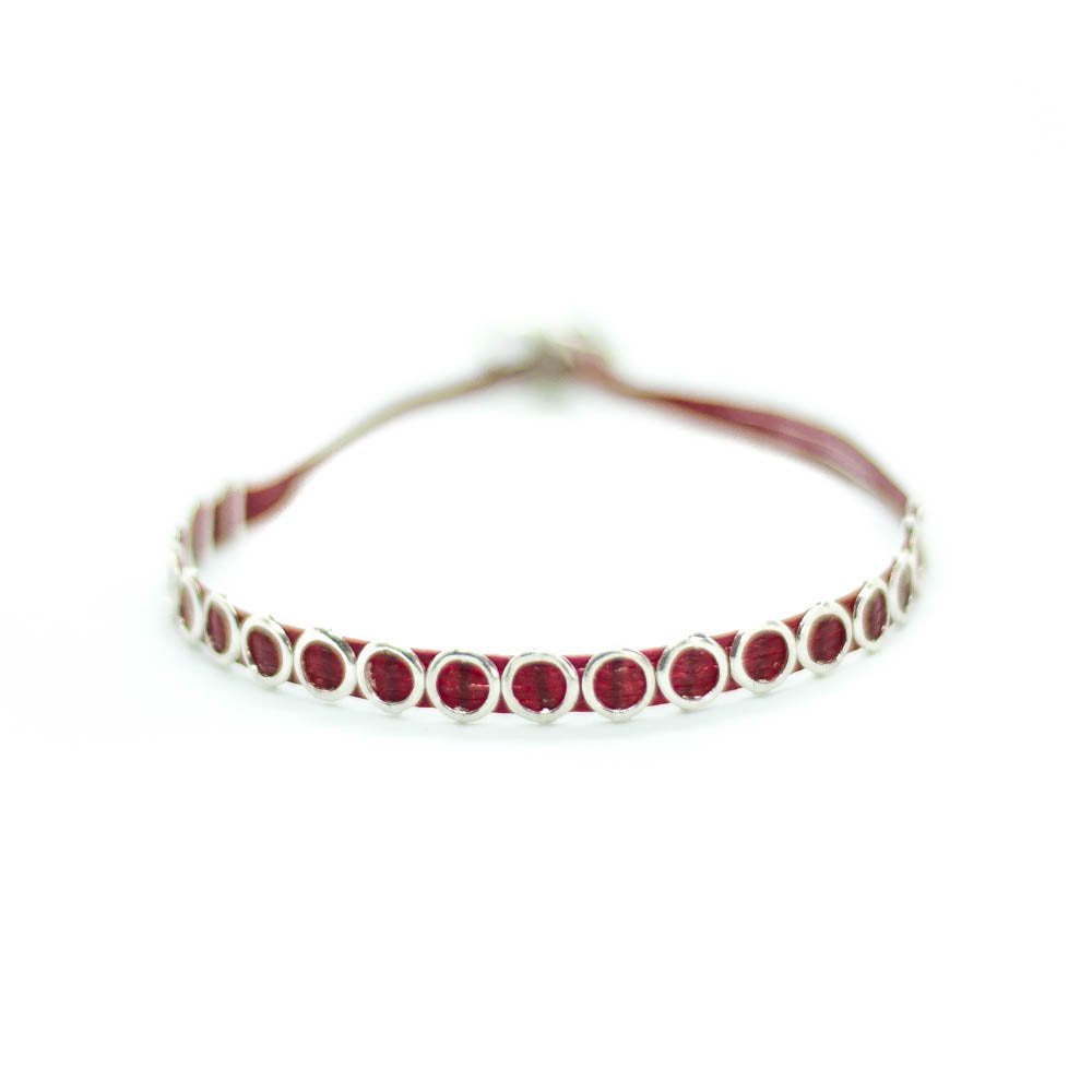 Custom design red string bracelet with  silver circle void beads.
