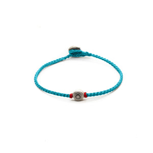 Silver Taurus zodiac sign bracelet with turquoise  hand braided chain.