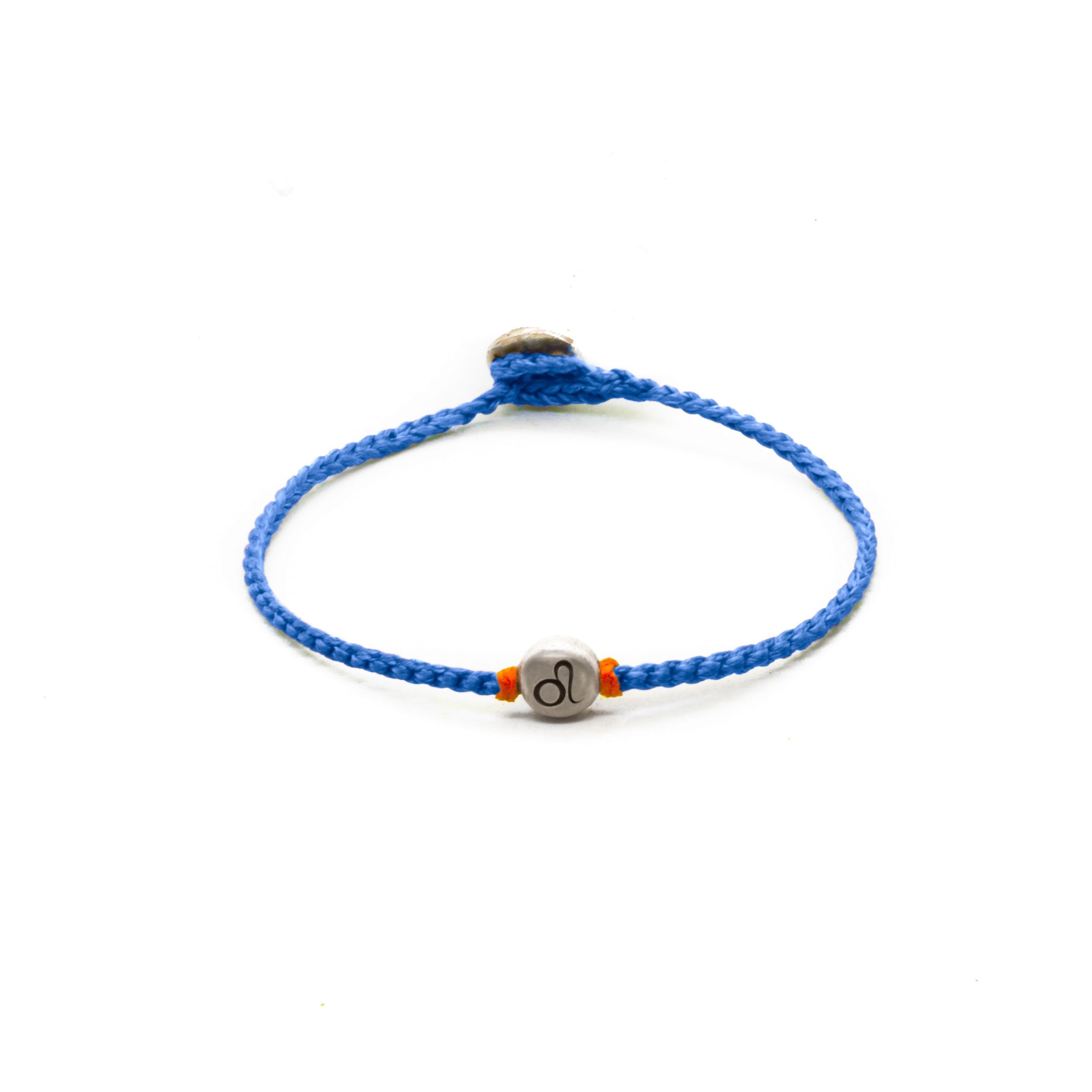 Silver Leo zodiac sign bracelet with blue hand braided chain.