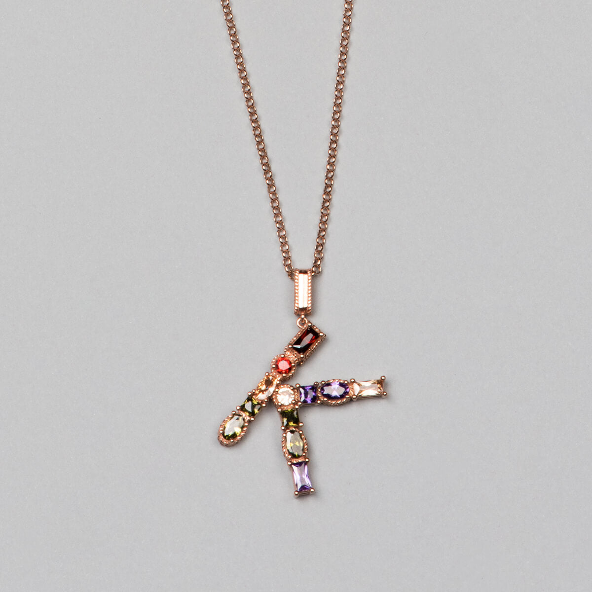 ‘K’ letter pendant necklace. 925 sterling silver, 18K rose gold plated.