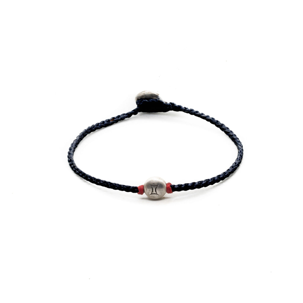 Silver Gemini zodiac sign bracelet with black hand braided chain.