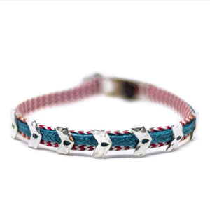 Custom design bracelet with six silver arrow signs attached on red-white and teal stripe.