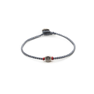 Silver Libra zodiac sign bracelet with grey hand braided chain.