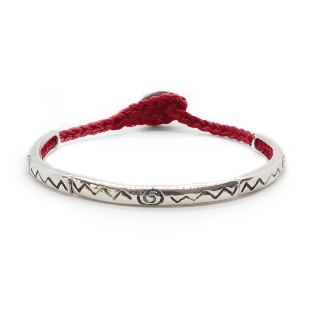 Custom design bracelet with three silver sticks with soul sign, on red hand braided string.