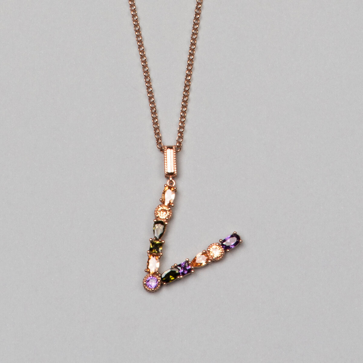 ‘V’ letter pendant necklace. 925 sterling silver, 18K rose gold plated.