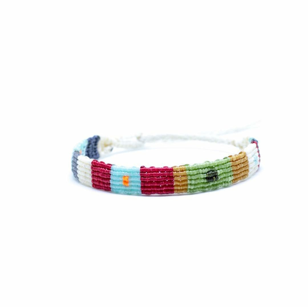 Bohemian style colorful hand braided macrame bracelet ending with silver clasp.