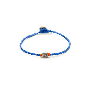 Silver Sagittarius zodiac sign bracelet with blue hand braided chain.