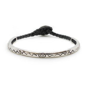 Custom design bracelet with three silver sticks with soul sign,  on black hand braided string.
